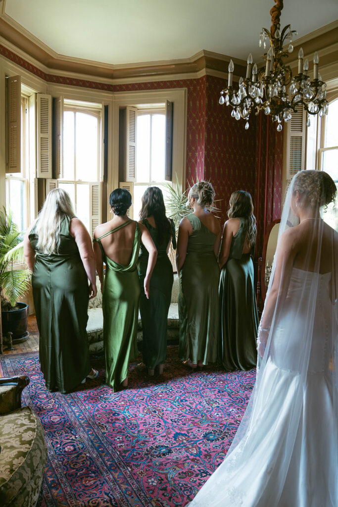 First look of the bride and her bridesmaids