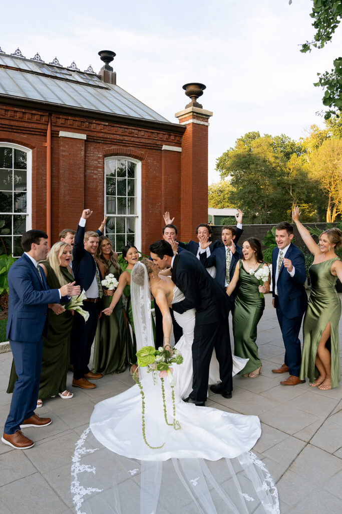Picture of the bride and groom with their bridal parties