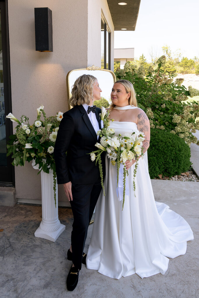 cute picture of the couple smiling at each other