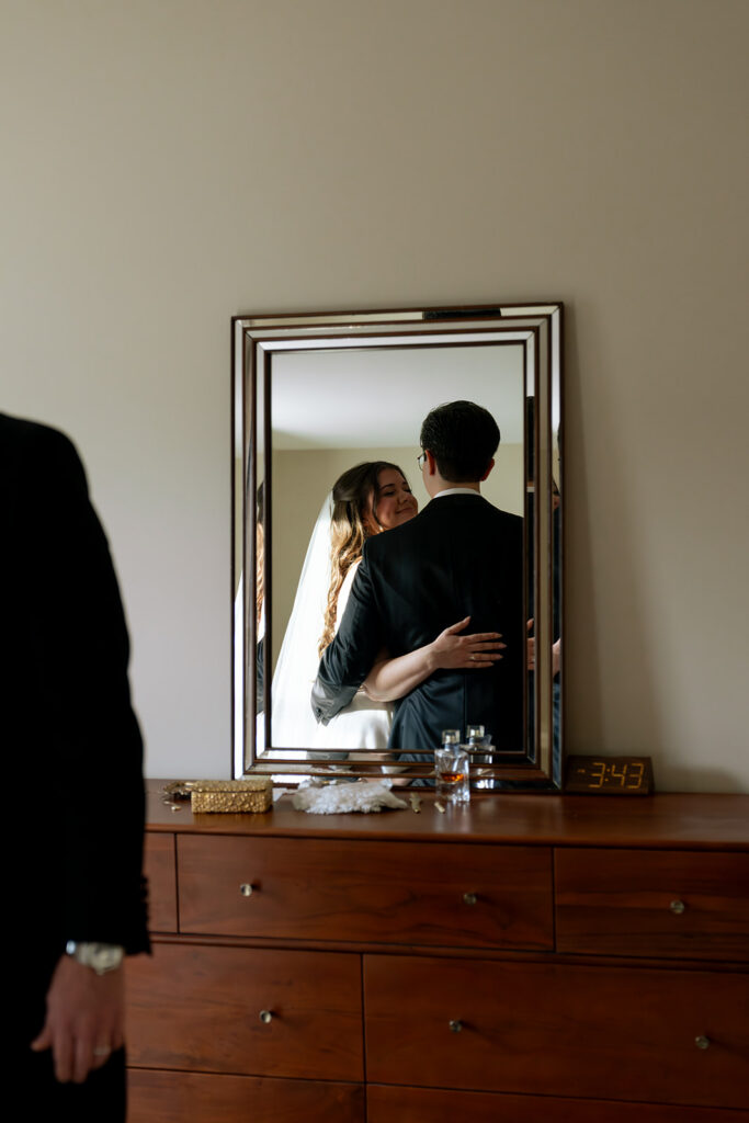 Cute picture of the bride and groom hugging