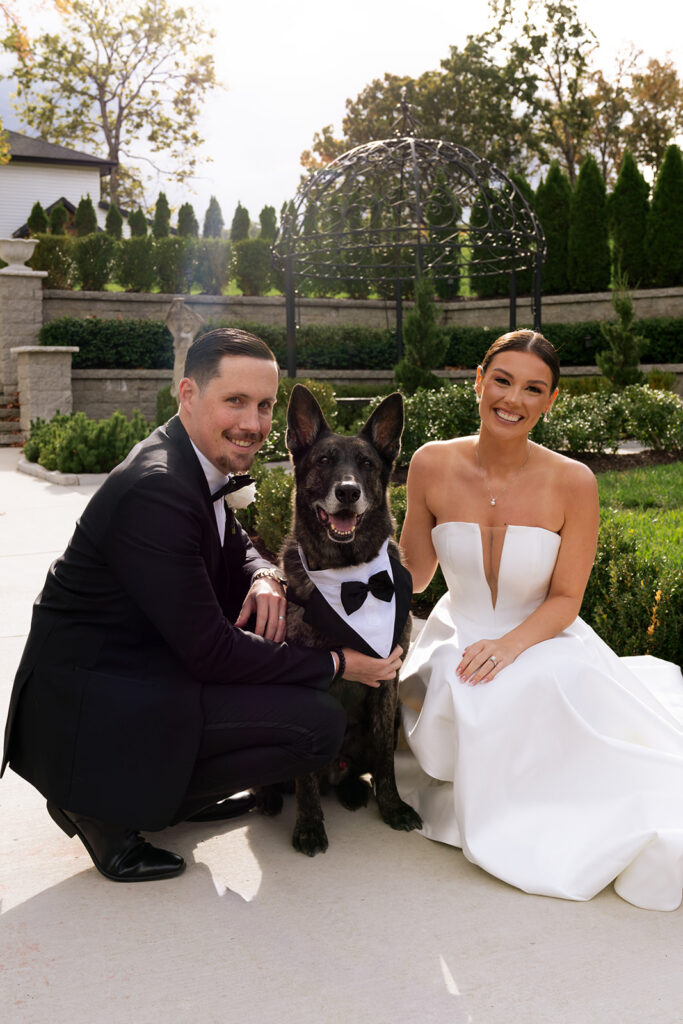 cute picture of the newlyweds and their dog