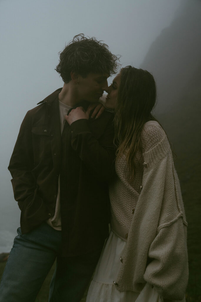 cute picture of the couple smiling at each other during their photoshoot