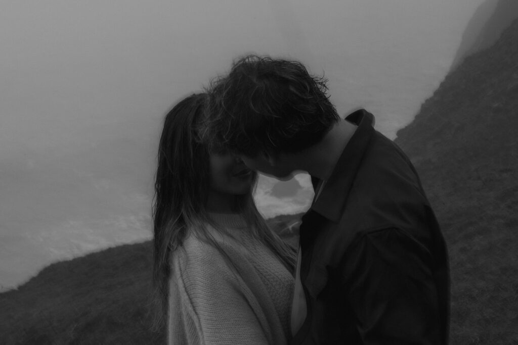 couple kissing during their playful couple portraits