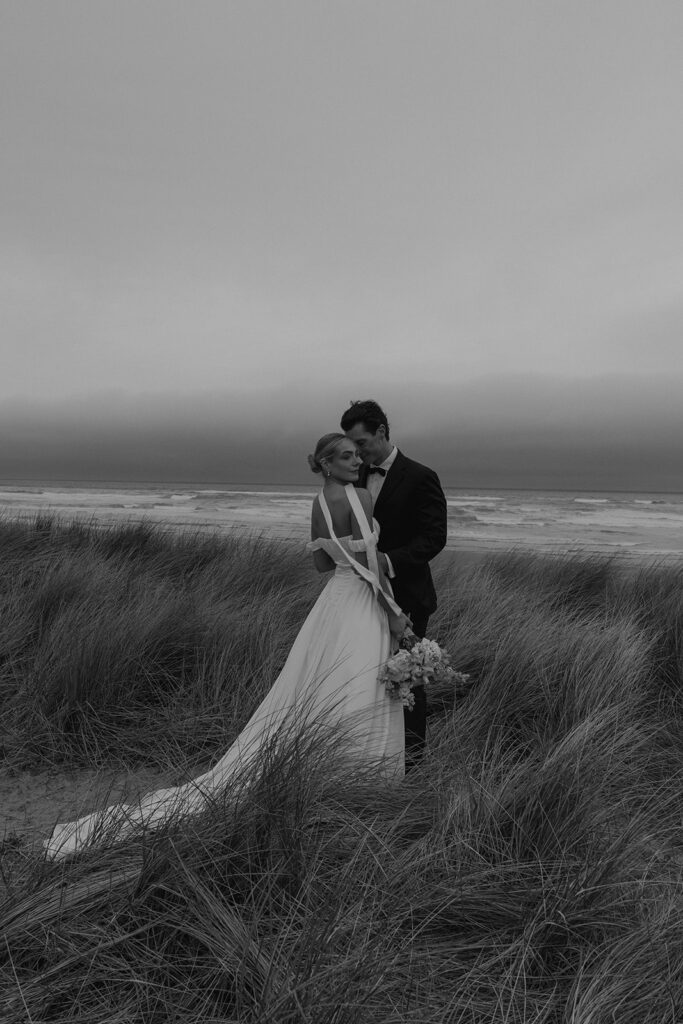 groom kissing the bride on the cheek