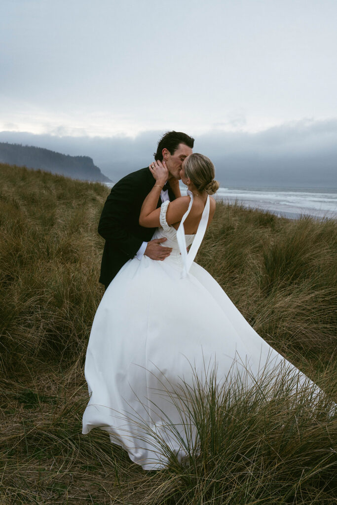 cute picture of the bride and groom kissing