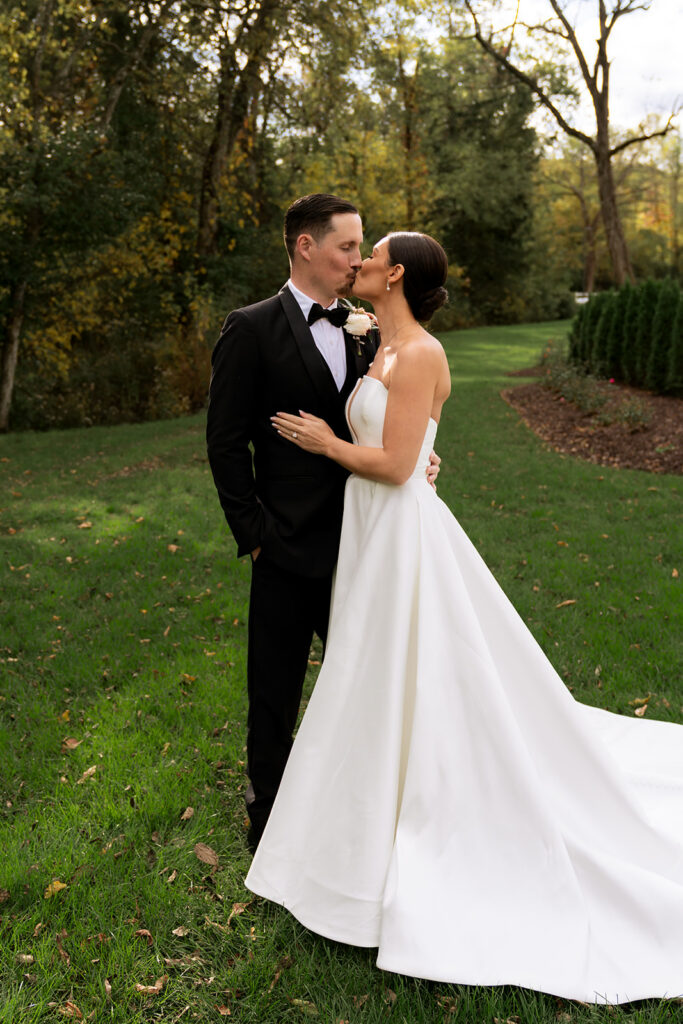 cute picture of the newlyweds kissing