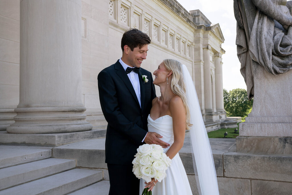 picture of the bride and groom smiling at each other