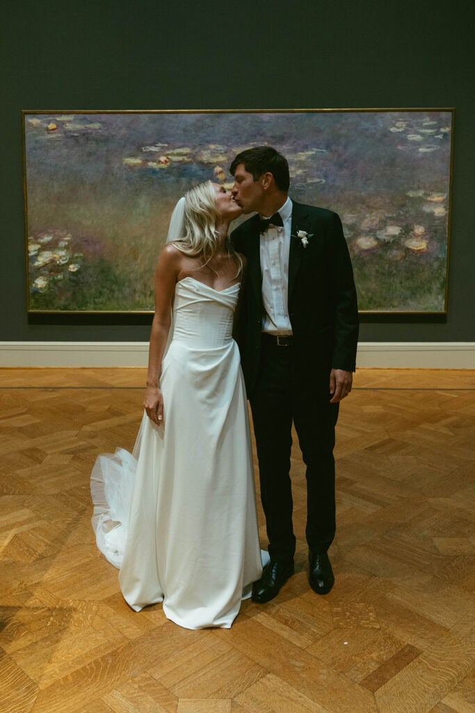 cute picture of the newlyweds kissing