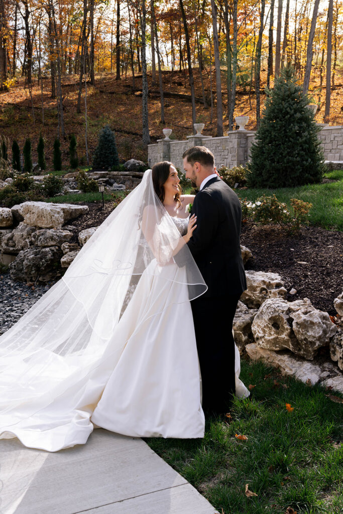 cute picture of the bride and groom smiling at each other