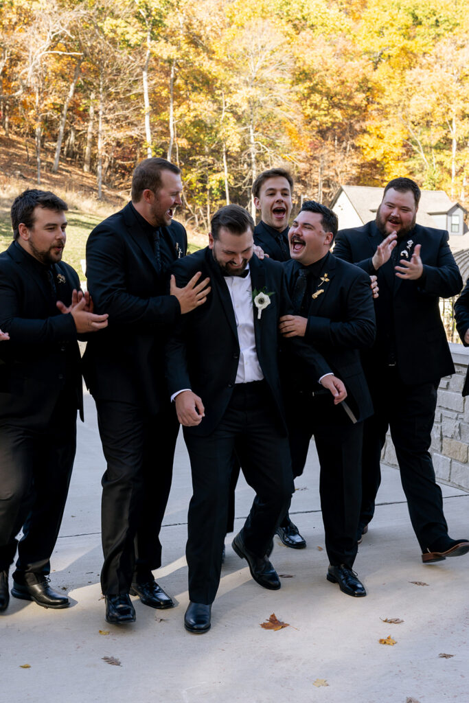 fun portrait of the groom and his friends