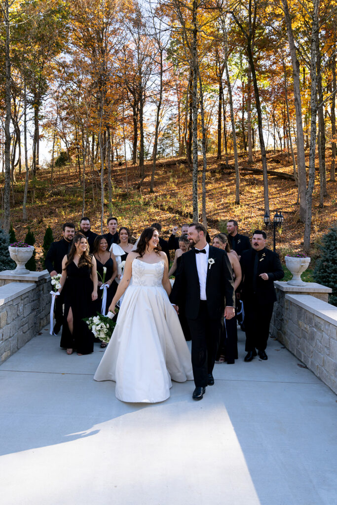 cute portrait of the bride and groom and their bridal parties