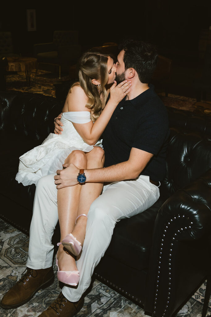 newly engaged couple kissing during their photoshoot