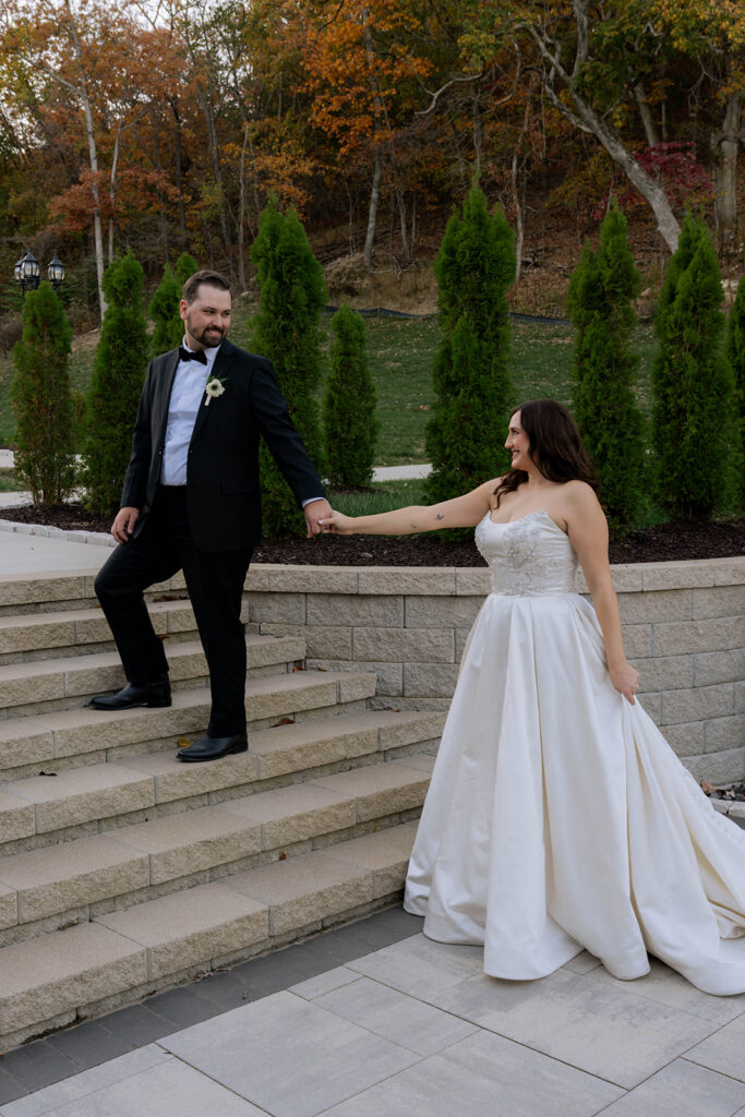 cute picture of the newlyweds holding hands