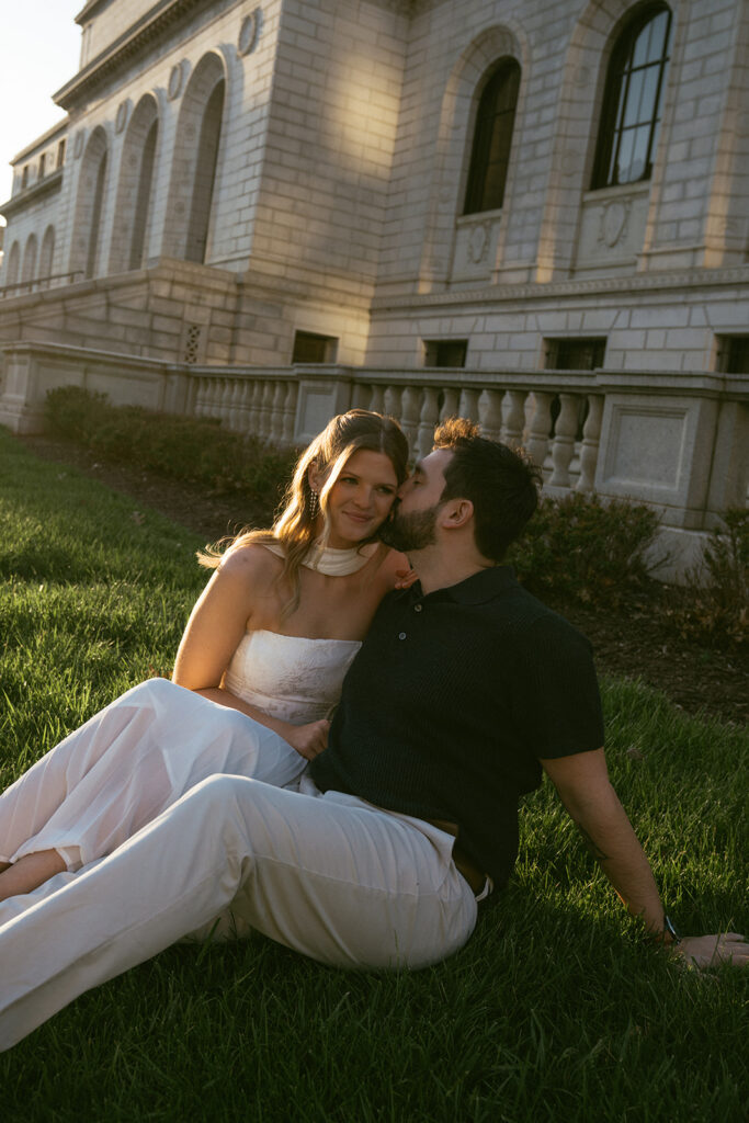 newly engaged couple kissing during their photoshoot