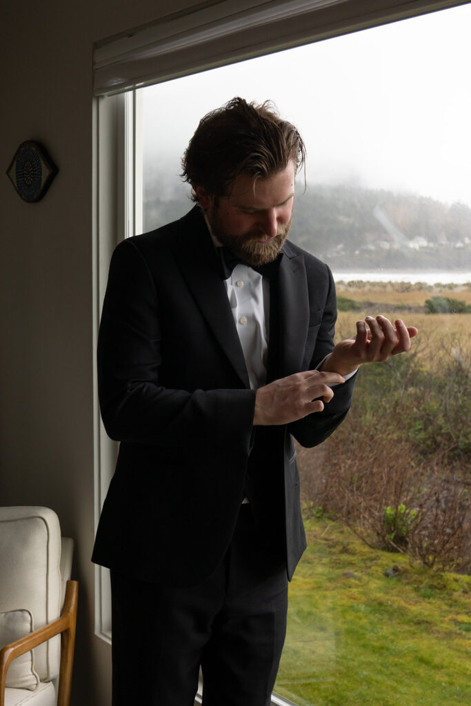 Groom getting ready for his intimate elopement