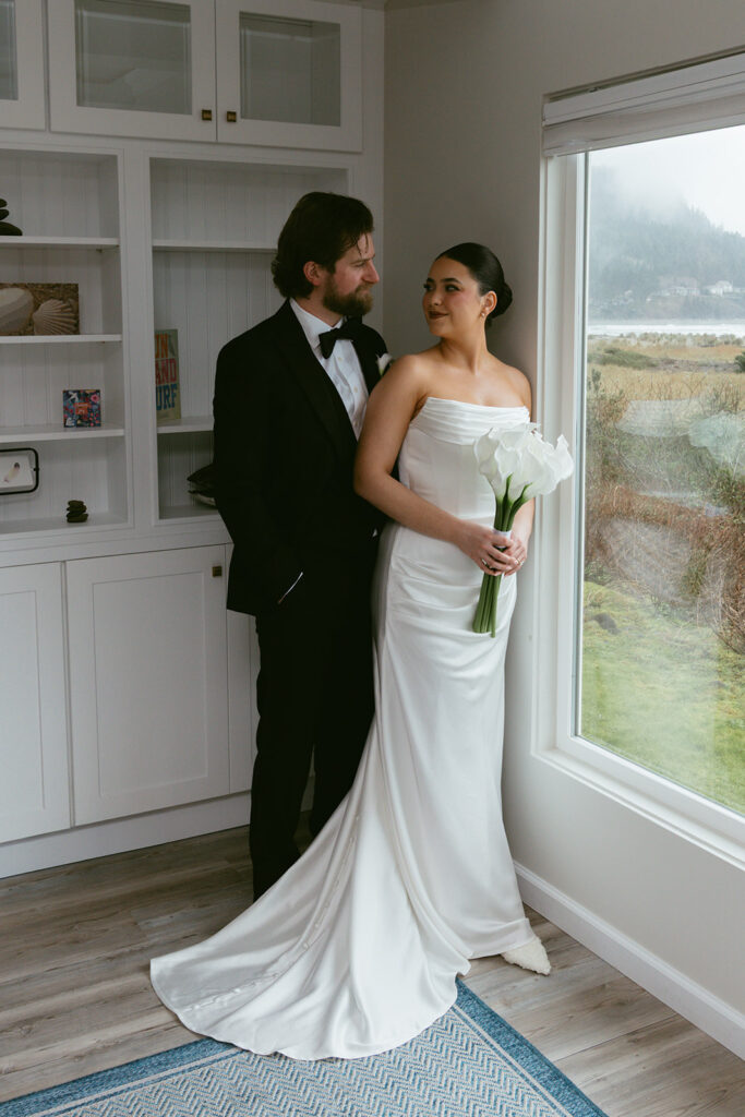 Cute picture of the bride and groom, smiling at each other