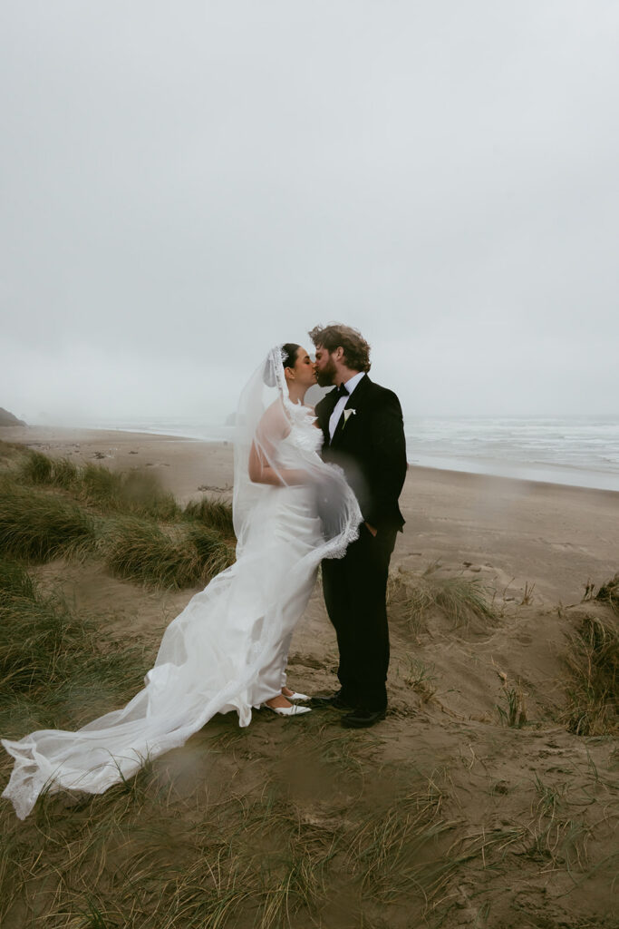 cute portrait of the newlyweds kissing