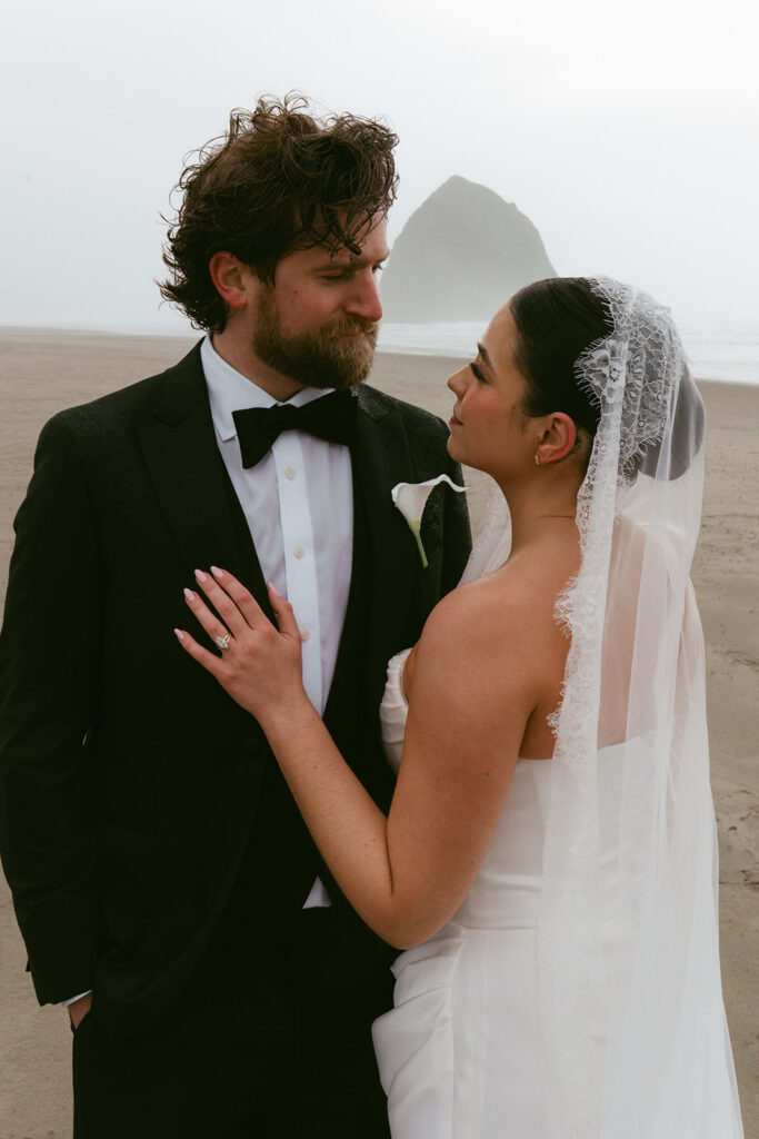 cute picture of the bride and groom smiling at each other
