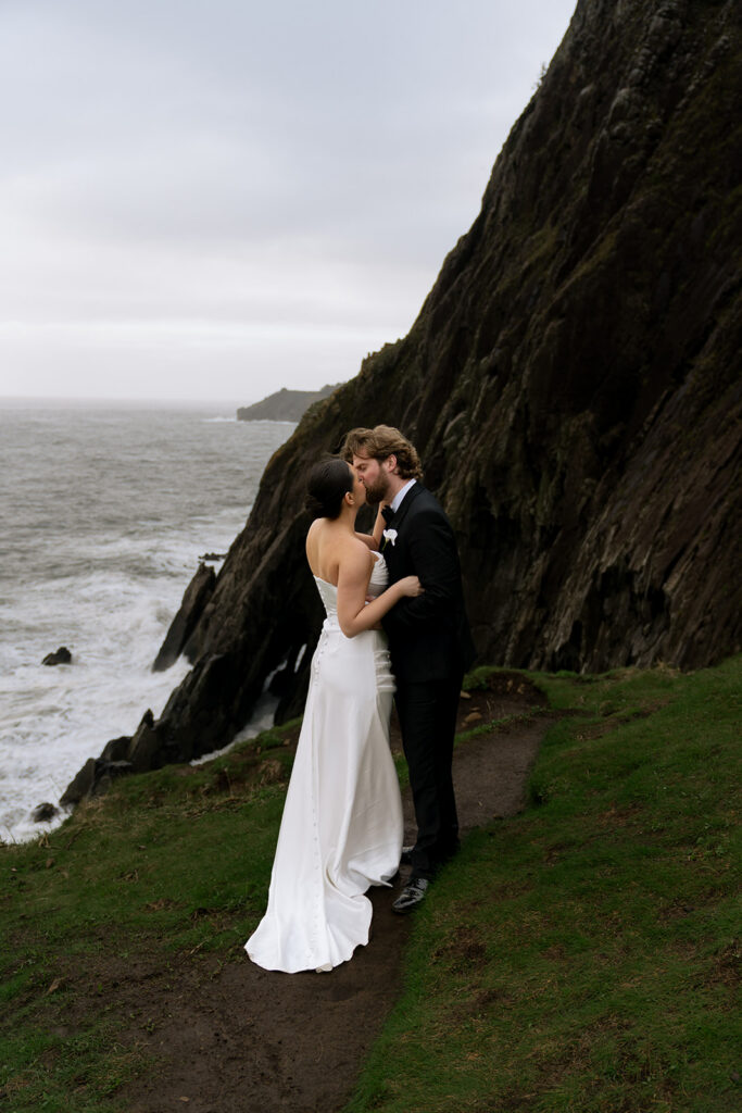 cute picture of the bride and groom kissing