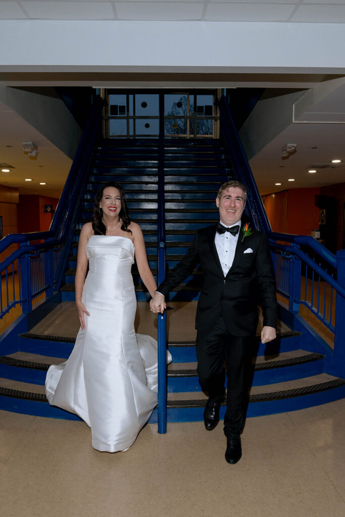 newlyweds arriving at their wedding reception