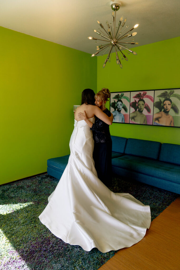 cute picture of the bride and her mom hugging