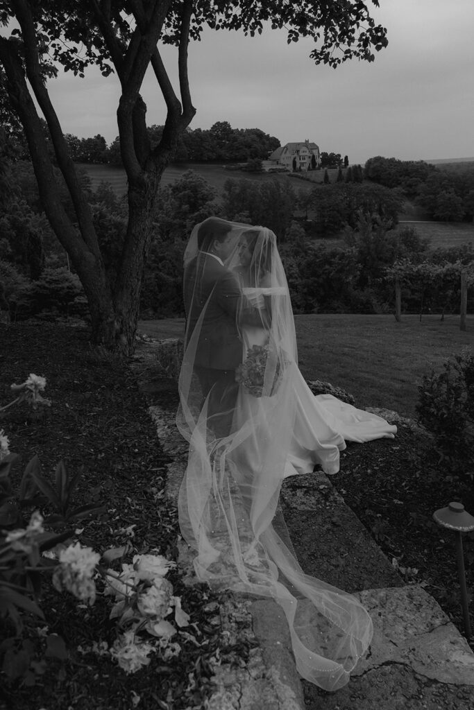 cute picture of the bride and groom kissing