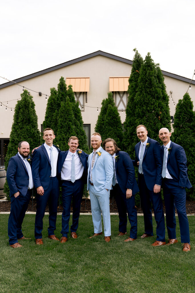 portrait of the groom and his friends