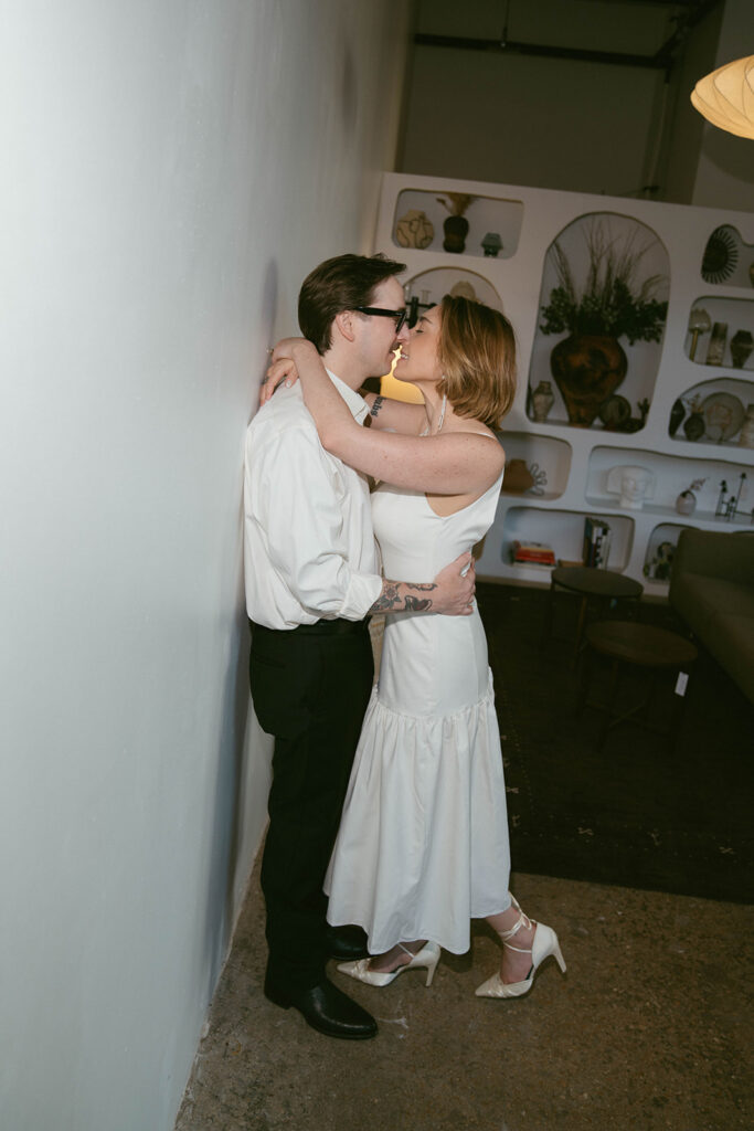 Fiancé, kissing his fiancé on the cheek