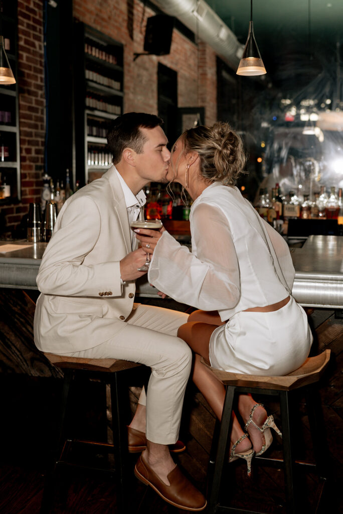 romantic portrait of the newly engaged couple kissing