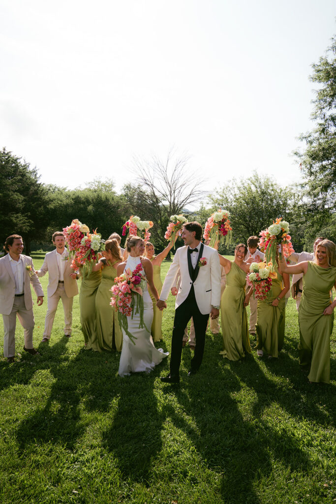 portrait of the bride and groom with their friends