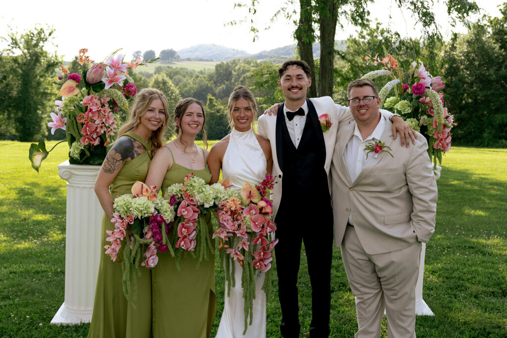 cute picture of the bride and groom with their friends