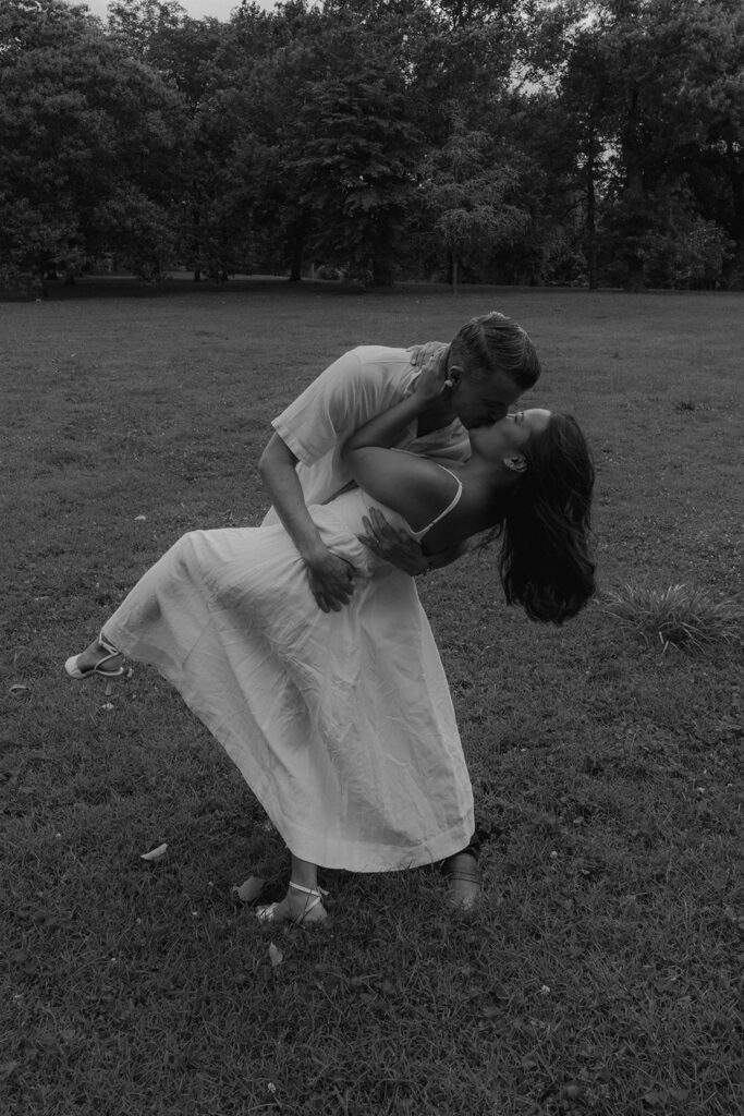 cute picture of the newly engaged couple kissing