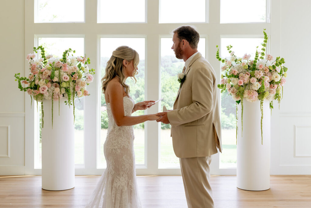 cute picture of the bride and groom holding hands