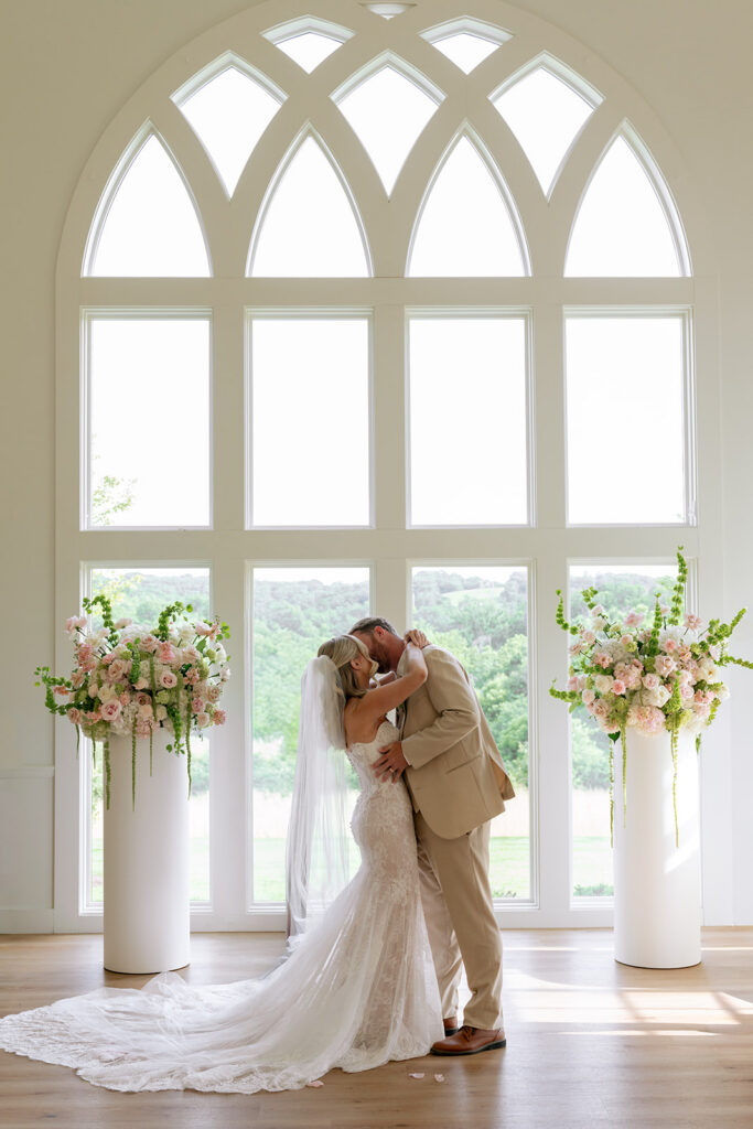 cute picture of the newlyweds kissing