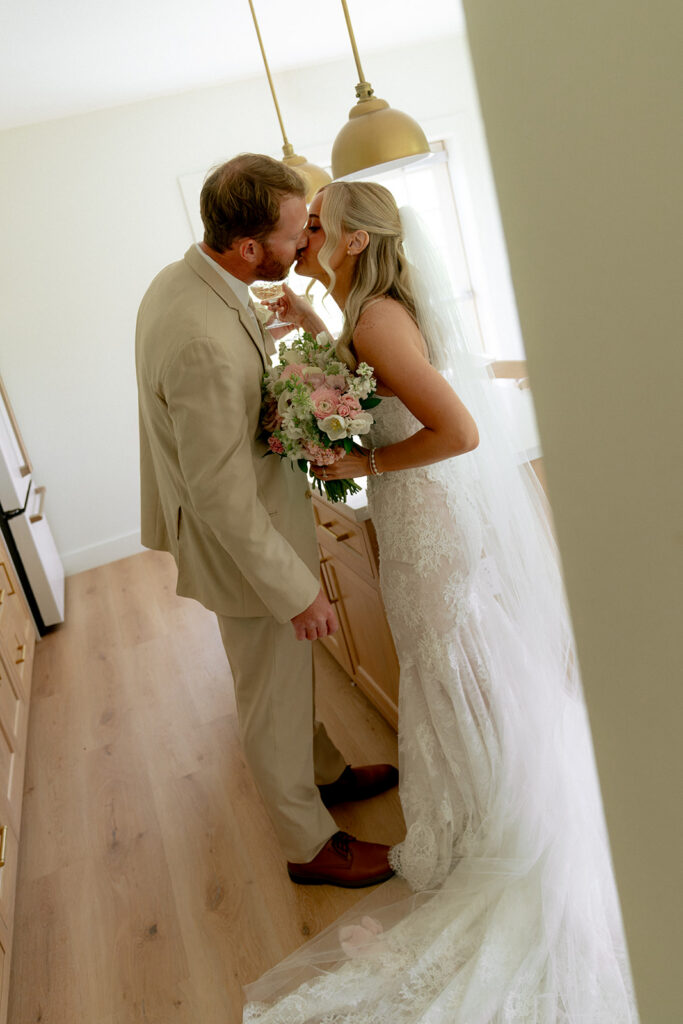 cute picture of the newlyweds kissing