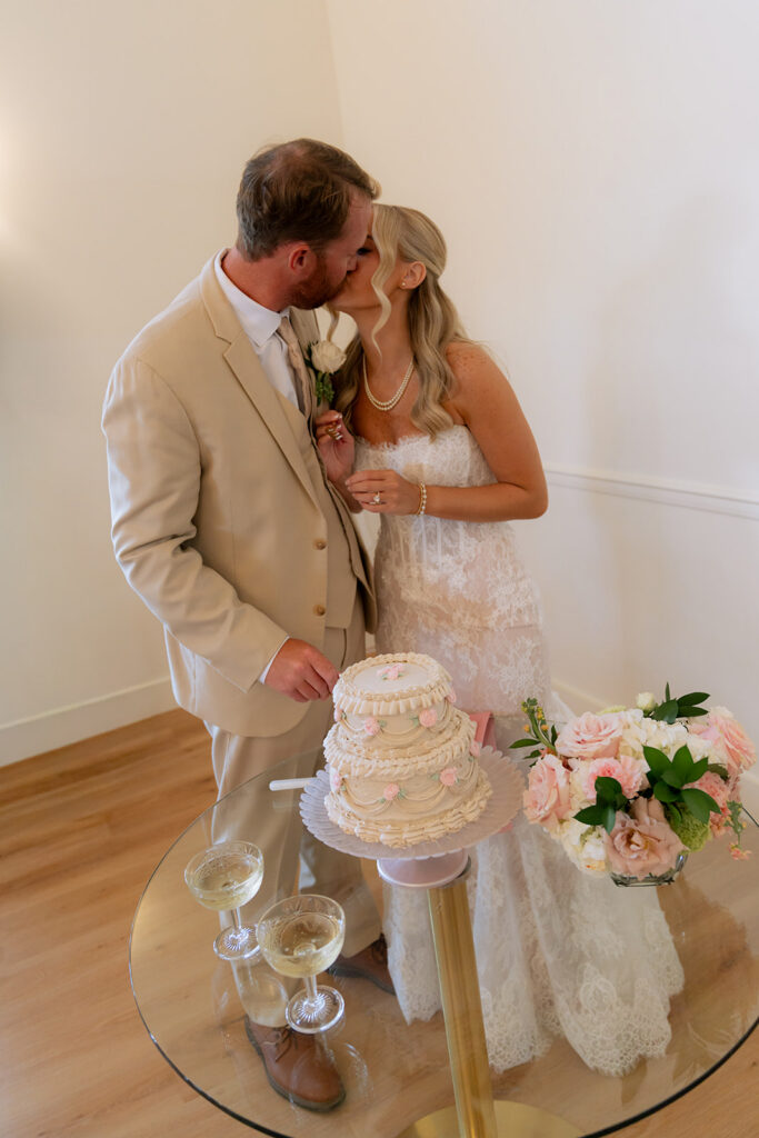 cute picture of the newlyweds kissing