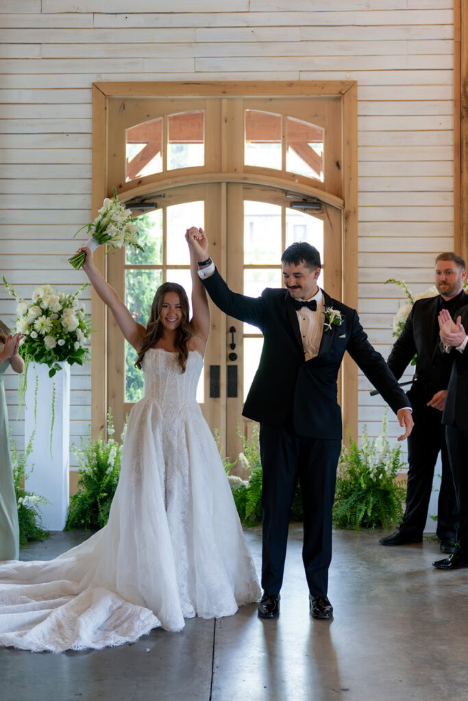 newlyweds heading to their wedding reception party