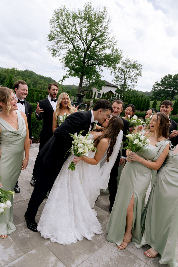 cute picture of the bride and groom kissing